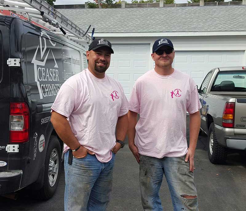 two men in pink shirts